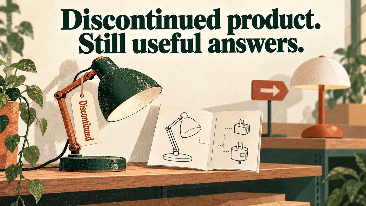 A discontinued desk lamp stands beside its instruction booklet, with a different newer lamp in the background. Editorial illustration of information needs after a product is retired.